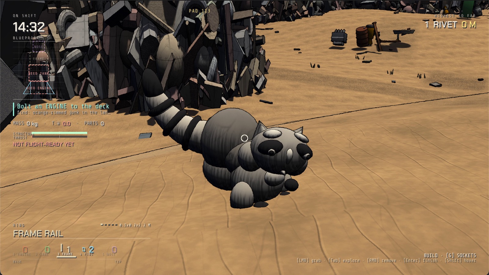 A raccoon lying in the sand in front of the scrap heaps, entirely unconcerned with the build checklist.